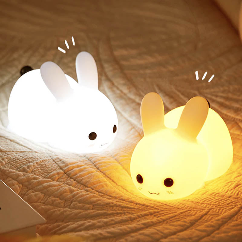Deux veilleuses bébé lapin qui brille avec un lumière différente