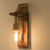 lampe de chevet corde et bois accrochée au mur